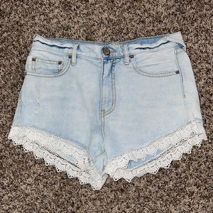 Free people light washed denim shorts